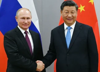 Vladimir Putin ajunge in China intr-o calatorie rara in strainatate